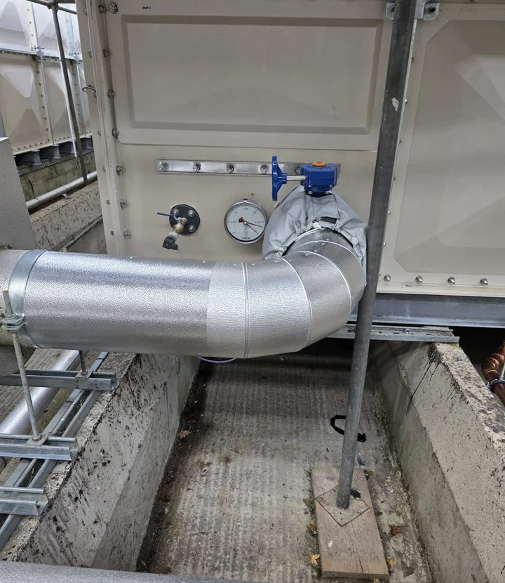 Aluminium service cladding fitted around commercial plant pipework