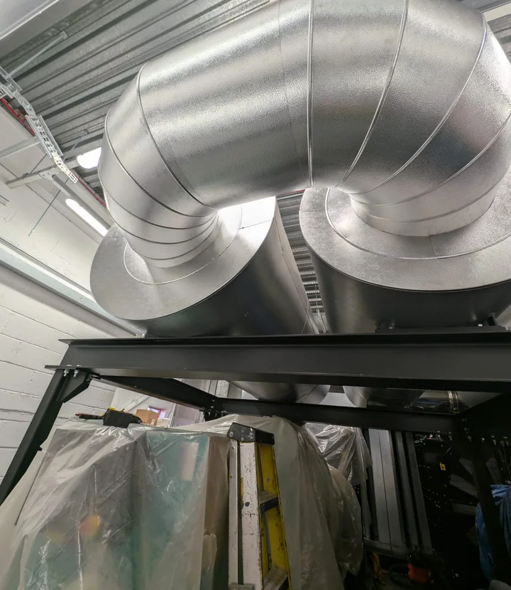 Commercial service insulation installed around constrained building routes