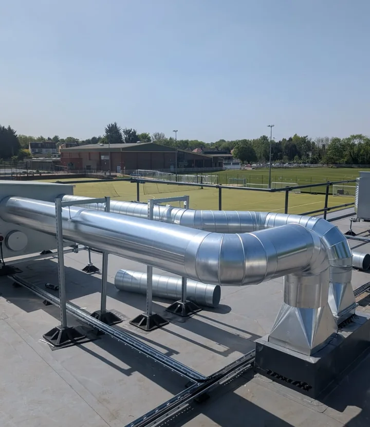 Insulated rooftop pipework on the Colfe School estate