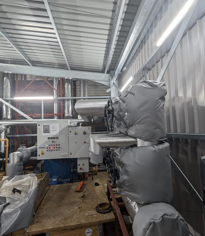 Removable insulation jackets fitted around food-production steam plant