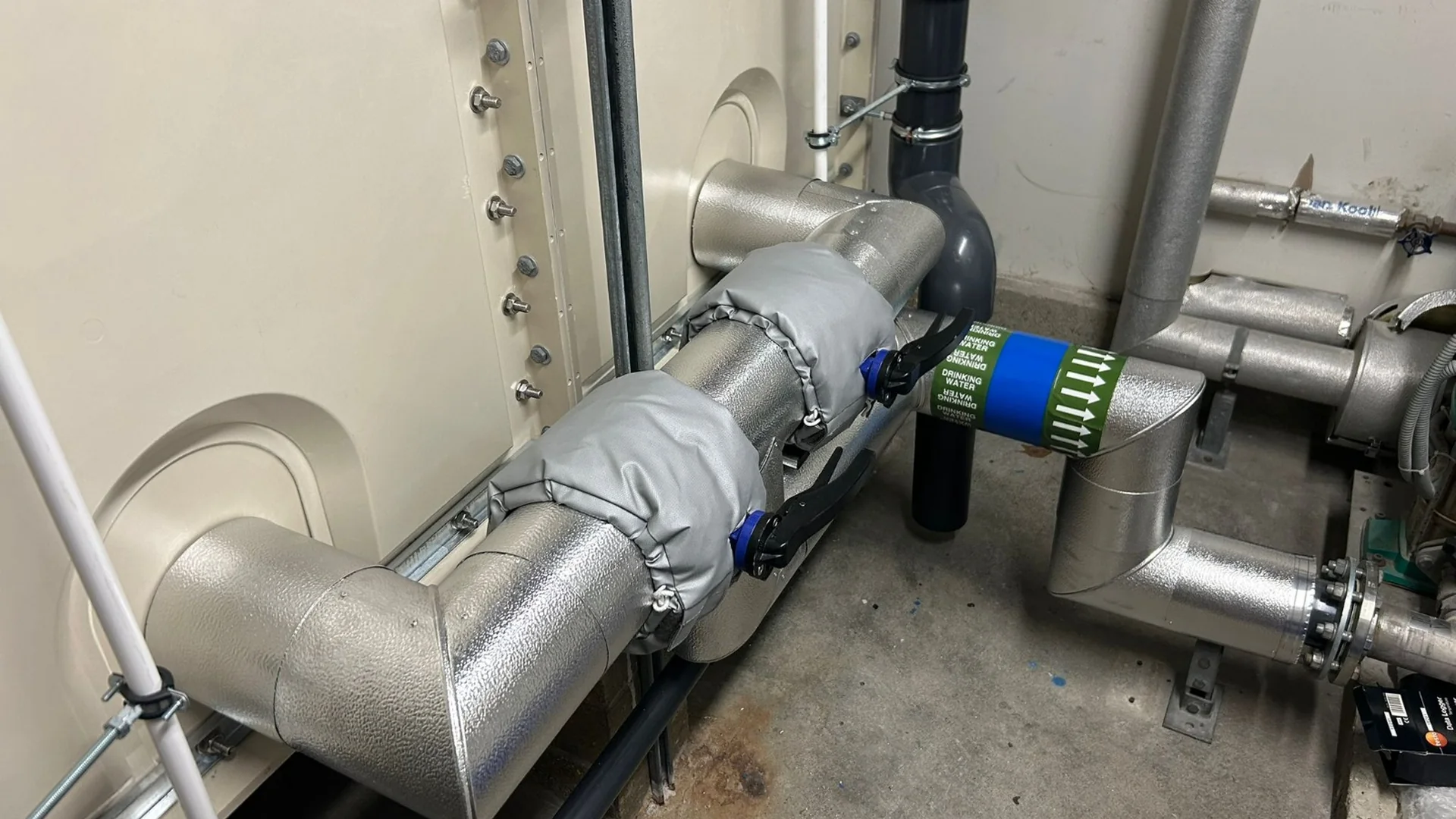 Completed plant-room pipework insulation supporting energy savings