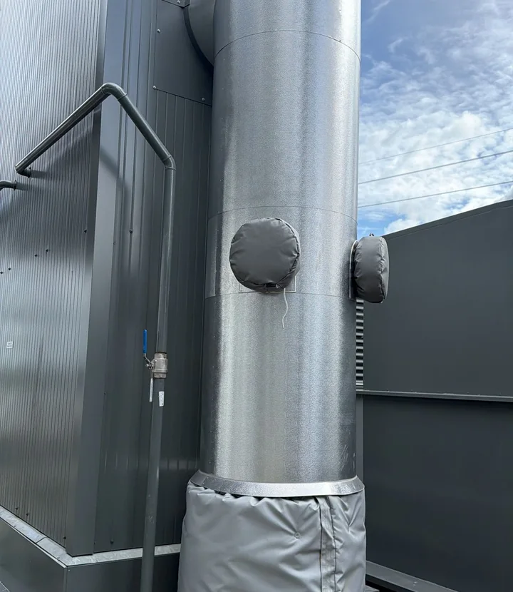 Cladded high-temperature exhaust vessel with removable access jackets at Thurrock Power