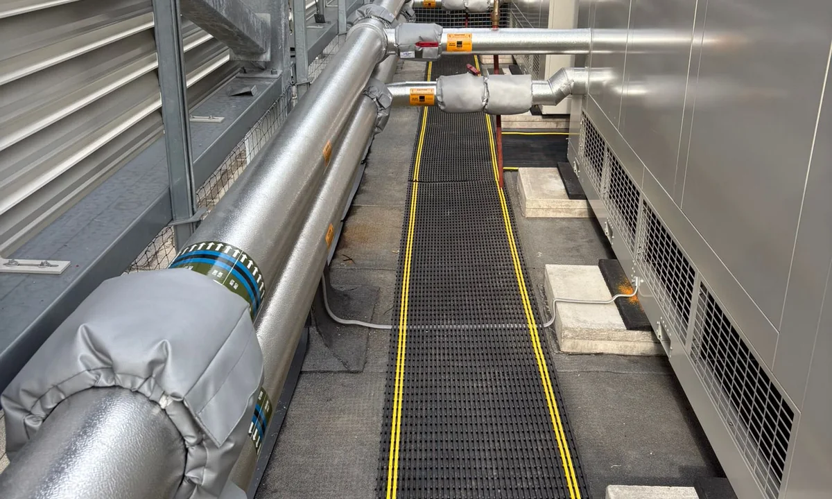 Completed trace-heated pipework with phenolic insulation, stucco cladding and removable jackets