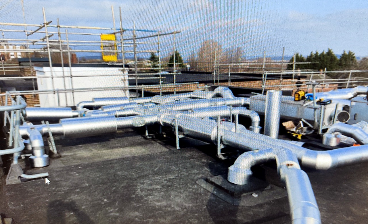 Assure Gas school roof ductwork and insulated services