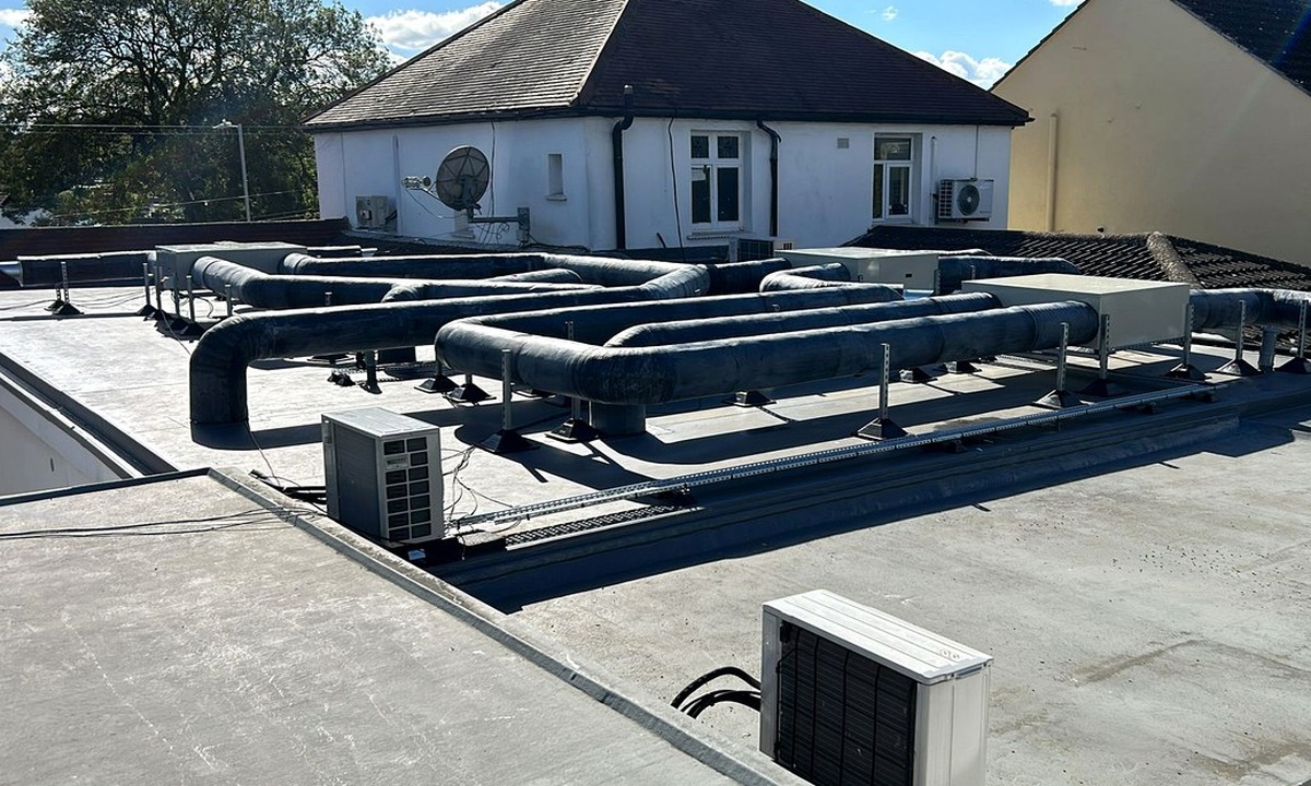 External service insulation on a rooftop commercial route