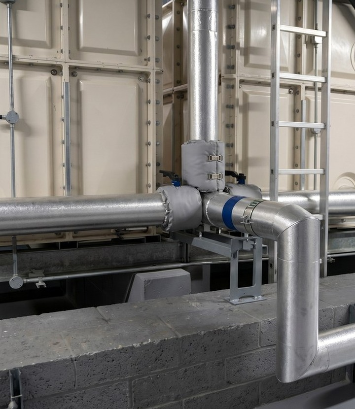 Utilities insulation detail around maintenance-heavy process services