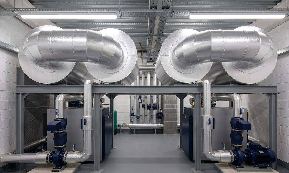 Residential development insulation across communal plant, risers and rooftop service routes