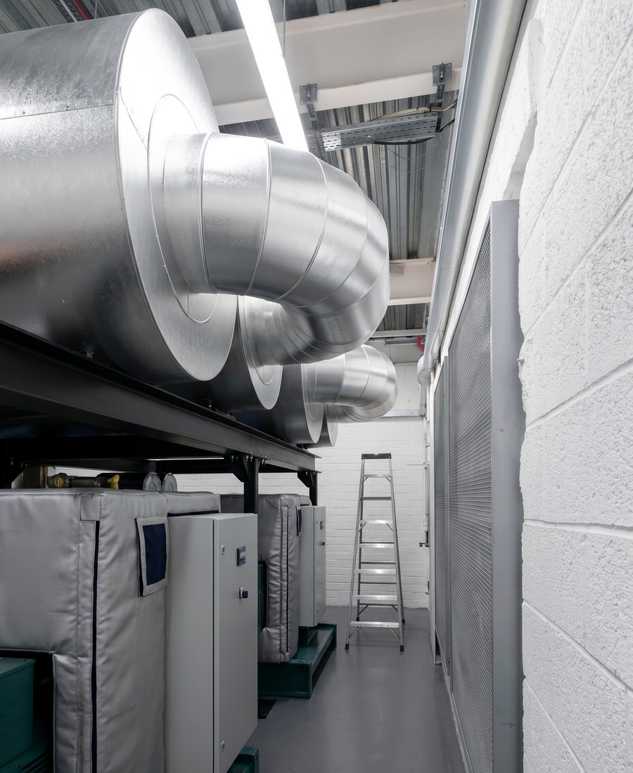 Residential development insulation across communal building services