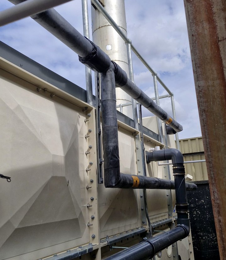Hygienic insulation detail with wipe-clean finish around service routes